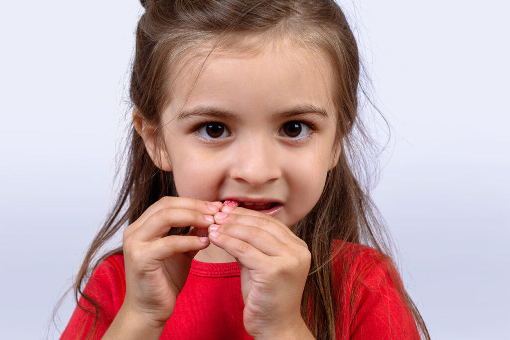 little-girl-eating-sweet-candy